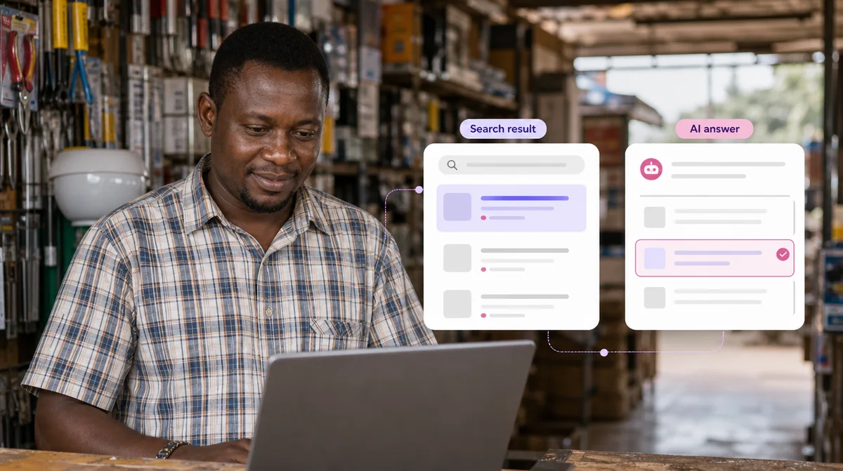 A hardware store owner in Douala looking at a laptop showing a search result beside an AI answer that names his business